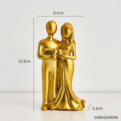 Toasting Couple Figurines
