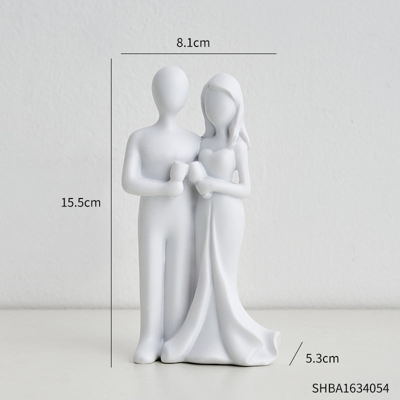 Toasting Couple Figurines