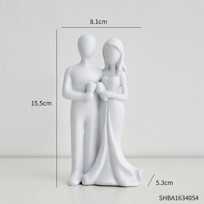 Toasting Couple Figurines